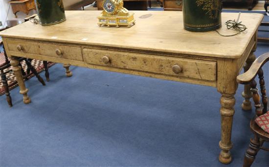A Victorian pine kitchen dining table, on later bun feet, 226 x 82cm